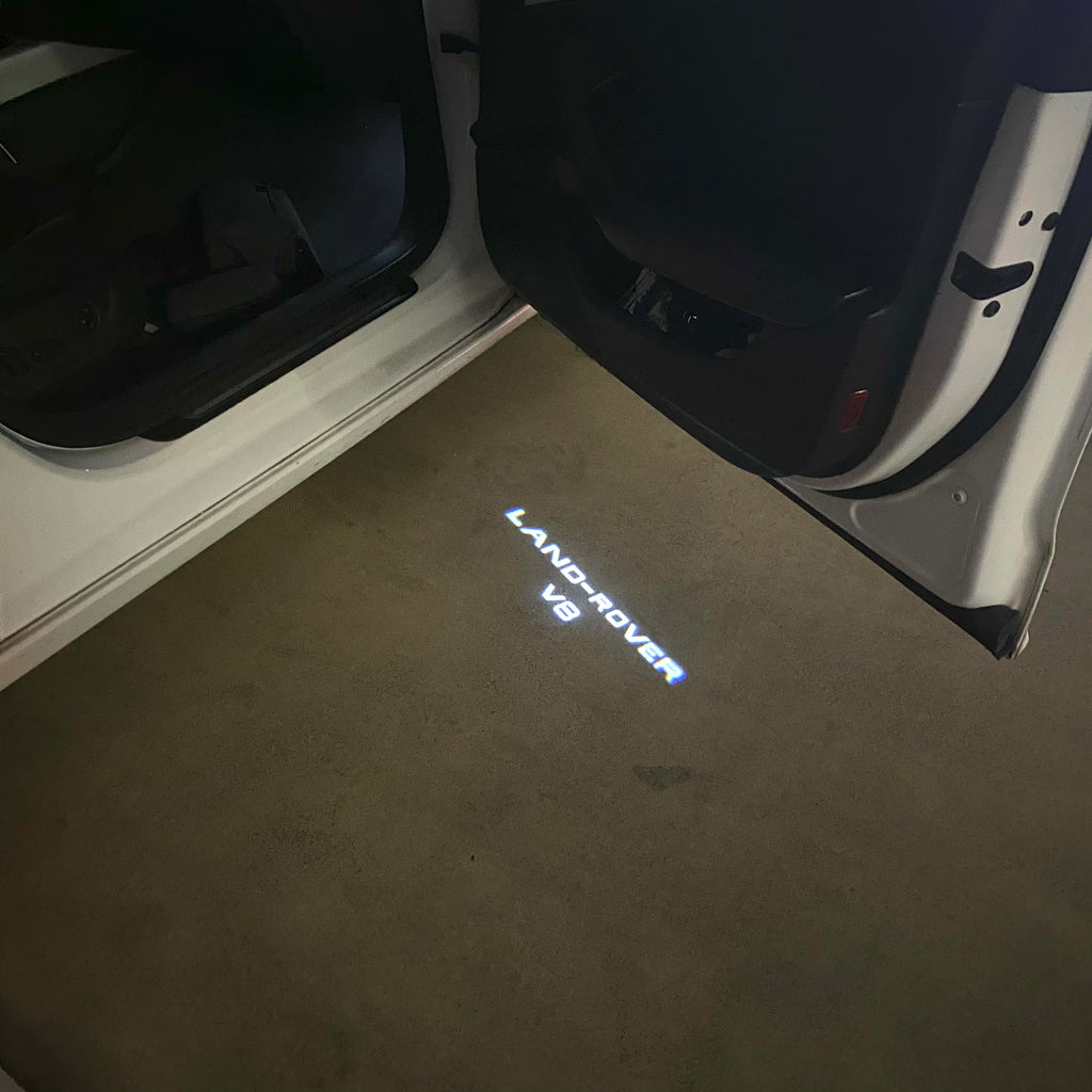 Land Rover LOGO PROJECROTR LIGHTS Nr.04 (الكمية 1 = 1 مجموعة / 2 أضواء باب)