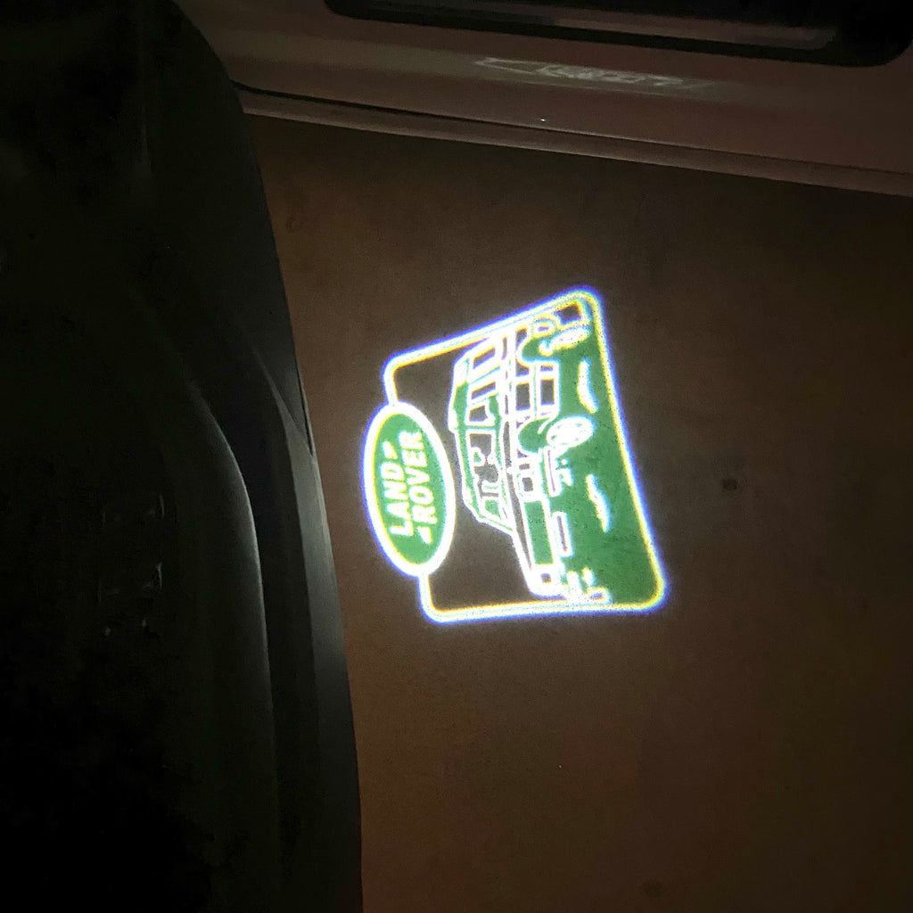 Land Rover LOGO PROJECROTR LIGHTS Nr.04 (الكمية 1 = 1 مجموعة / 2 أضواء باب)