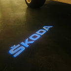 SKODA ORIGINAL LOGO PROJECTOT LIGHTS Nr.857(quantity  1 =  2 Logo Film /  2 door lights)
