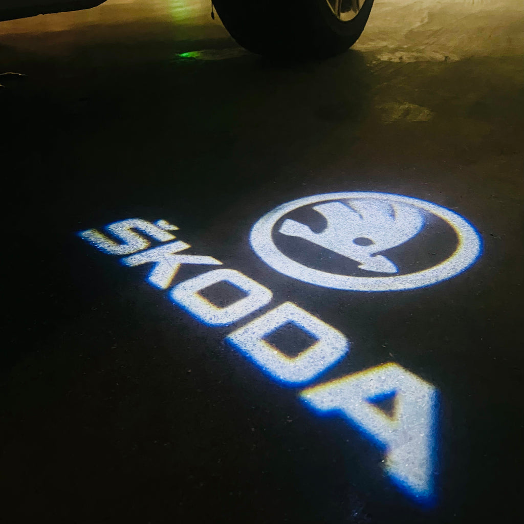 SKODA ORIGINAL LOGO PROJECTOT LIGHTS Nr.09(quantity  1 =  2 Logo Film /  2 door lights)