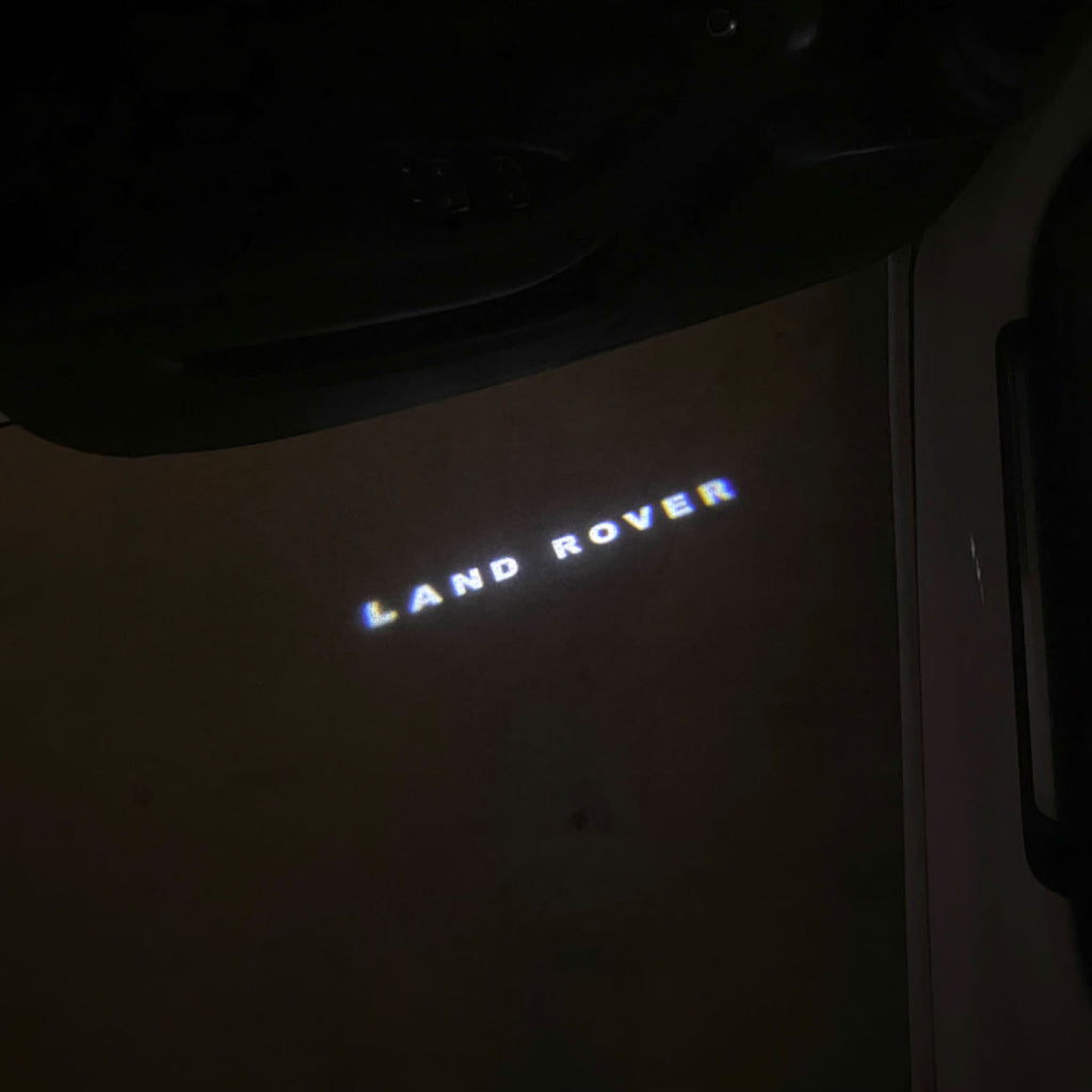 Land Rover LOGO PROJECROTR LIGHTS Nr.04 (الكمية 1 = 1 مجموعة / 2 أضواء باب)