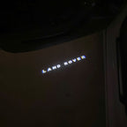 Land Rover LOGO PROJECROTR LIGHTS Nr.04 (الكمية 1 = 1 مجموعة / 2 أضواء باب)