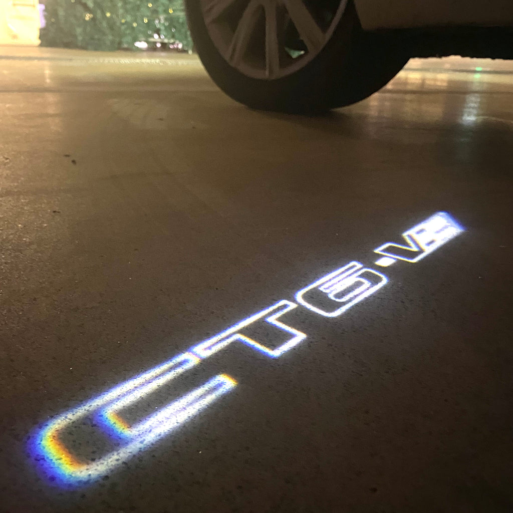 AUDI LOGO PROJECTOT LIGHTS Nr.19 (الكمية 1 = 2 Logo Films /2 أضواء الباب)