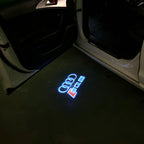 AUDI LOGO PROJECTOT LIGHTS Nr.120 (الكمية 1 = 2 Logo Films /2 أضواء الباب)