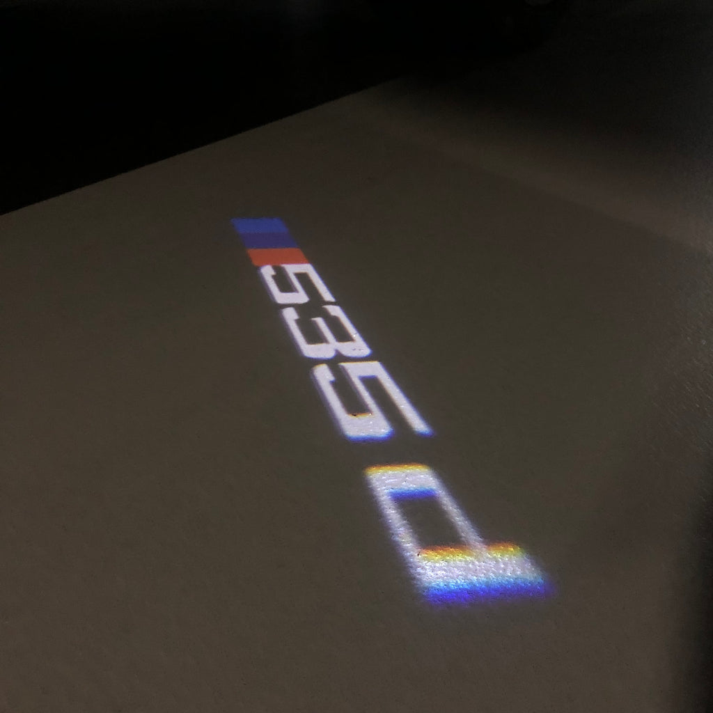 BMW M3 LOGO PROJECTOR LIGHTS Nr.24 (الكمية 1 = 1 مجموعة / 2 أضواء باب)