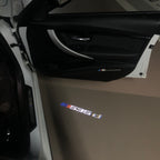 BMW M3 LOGO PROJECTOR LIGHTS Nr.24 (الكمية 1 = 1 مجموعة / 2 أضواء باب)