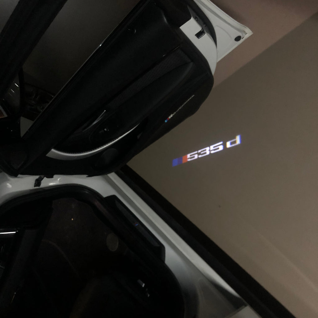 BMW M3 LOGO PROJECTOR LIGHTS Nr.24 (الكمية 1 = 1 مجموعة / 2 أضواء باب)