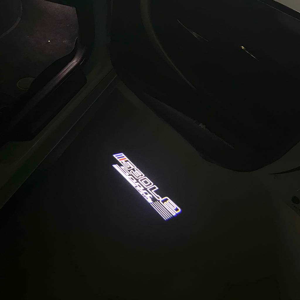 BMW M3 LOGO PROJECTOR LIGHTS Nr.24 (الكمية 1 = 1 مجموعة / 2 أضواء باب)