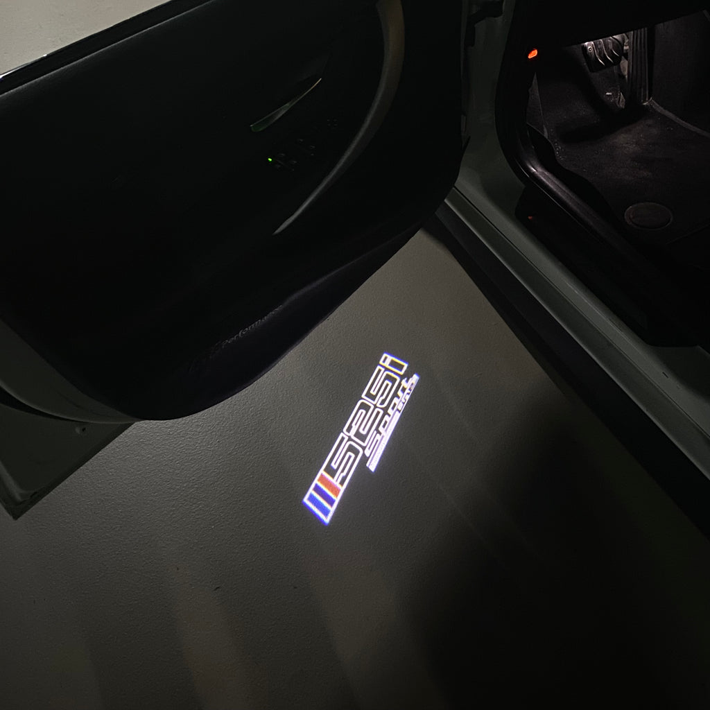 BMW M3 LOGO PROJECTOR LIGHTS Nr.24 (الكمية 1 = 1 مجموعة / 2 أضواء باب)