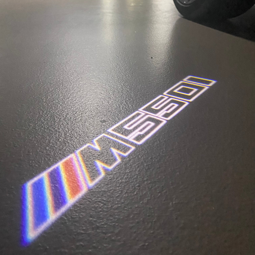 BMW M3 LOGO PROJECTOR LIGHTS Nr.24 (الكمية 1 = 1 مجموعة / 2 أضواء باب)