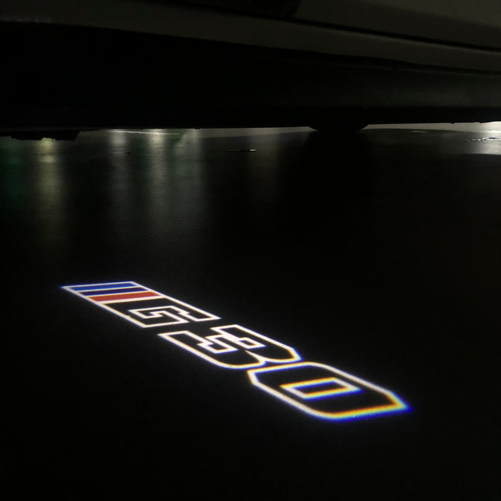 BMW M3 LOGO PROJECTOR LIGHTS Nr.24 (الكمية 1 = 1 مجموعة / 2 أضواء باب)