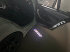BMW M3 LOGO PROJECTOR LIGHTS Nr.24 (الكمية 1 = 1 مجموعة / 2 أضواء باب)