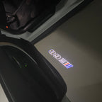 BMW M3 LOGO PROJECTOR LIGHTS Nr.24 (الكمية 1 = 1 مجموعة / 2 أضواء باب)