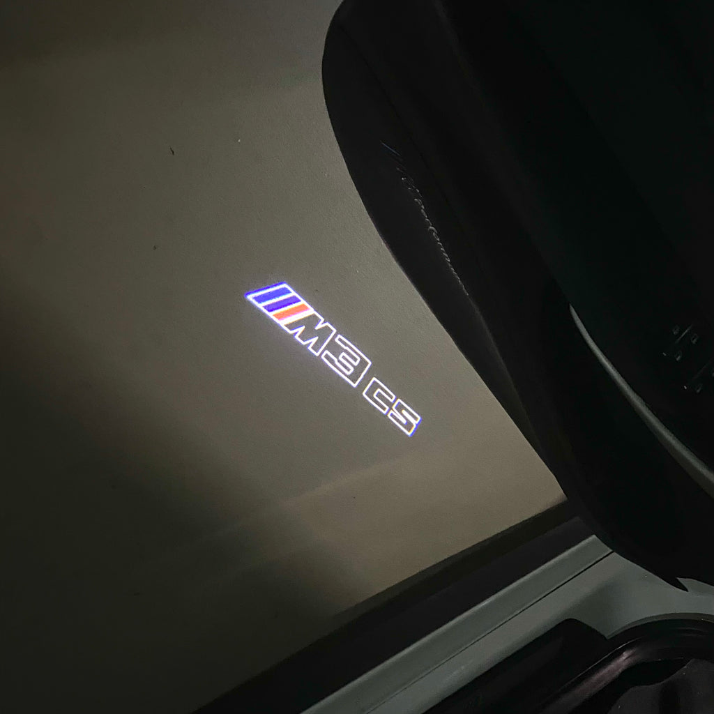 BMW M3 LOGO PROJECTOR LIGHTS Nr.24 (الكمية 1 = 1 مجموعة / 2 أضواء باب)