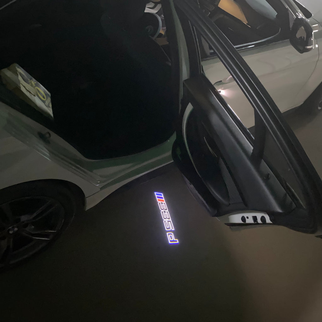 BMW M3 LOGO PROJECTOR LIGHTS Nr.24 (الكمية 1 = 1 مجموعة / 2 أضواء باب)