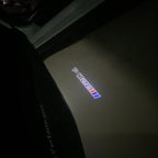 BMW M3 LOGO PROJECTOR LIGHTS Nr.24 (الكمية 1 = 1 مجموعة / 2 أضواء باب)