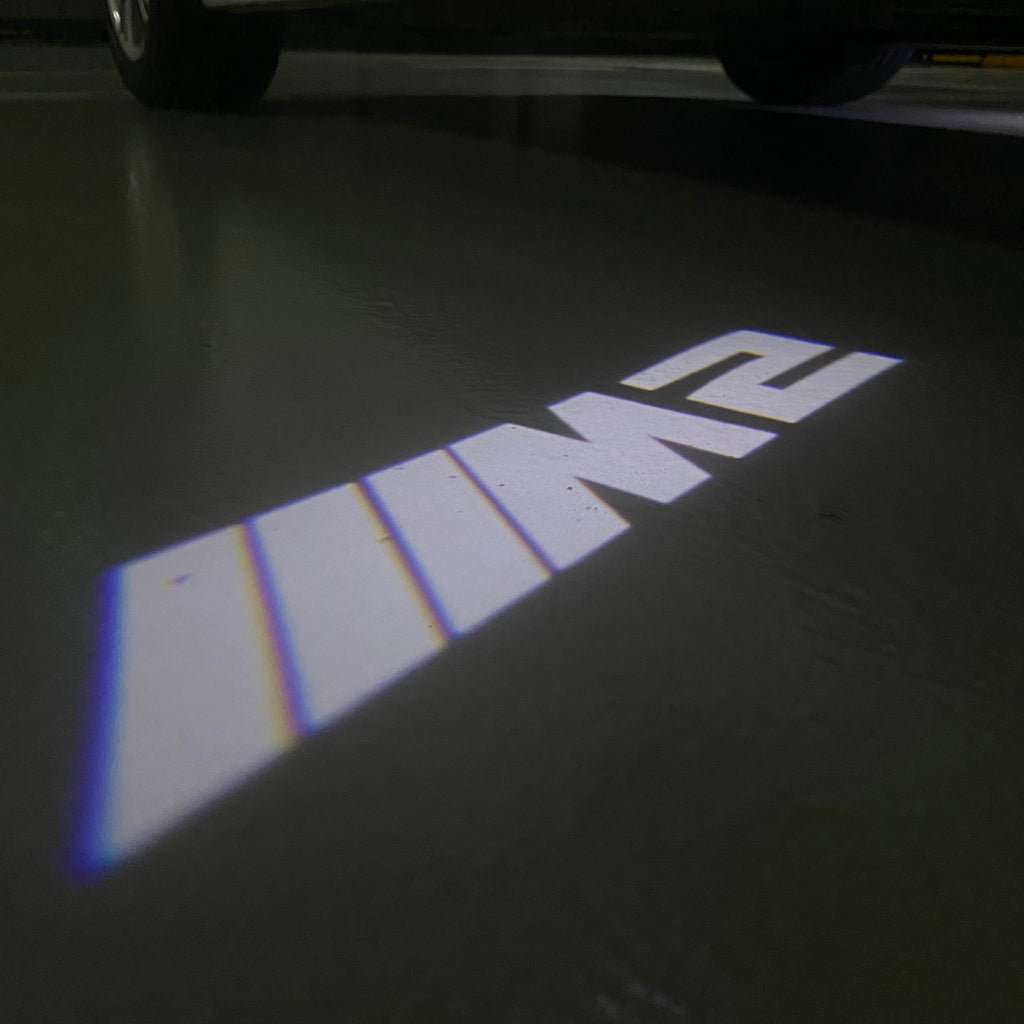 BMW M3 LOGO PROJECTOR LIGHTS Nr.24 (الكمية 1 = 1 مجموعة / 2 أضواء باب)