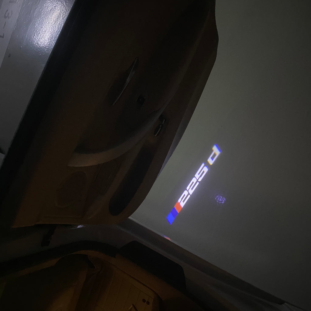 BMW M3 LOGO PROJECTOR LIGHTS Nr.24 (الكمية 1 = 1 مجموعة / 2 أضواء باب)