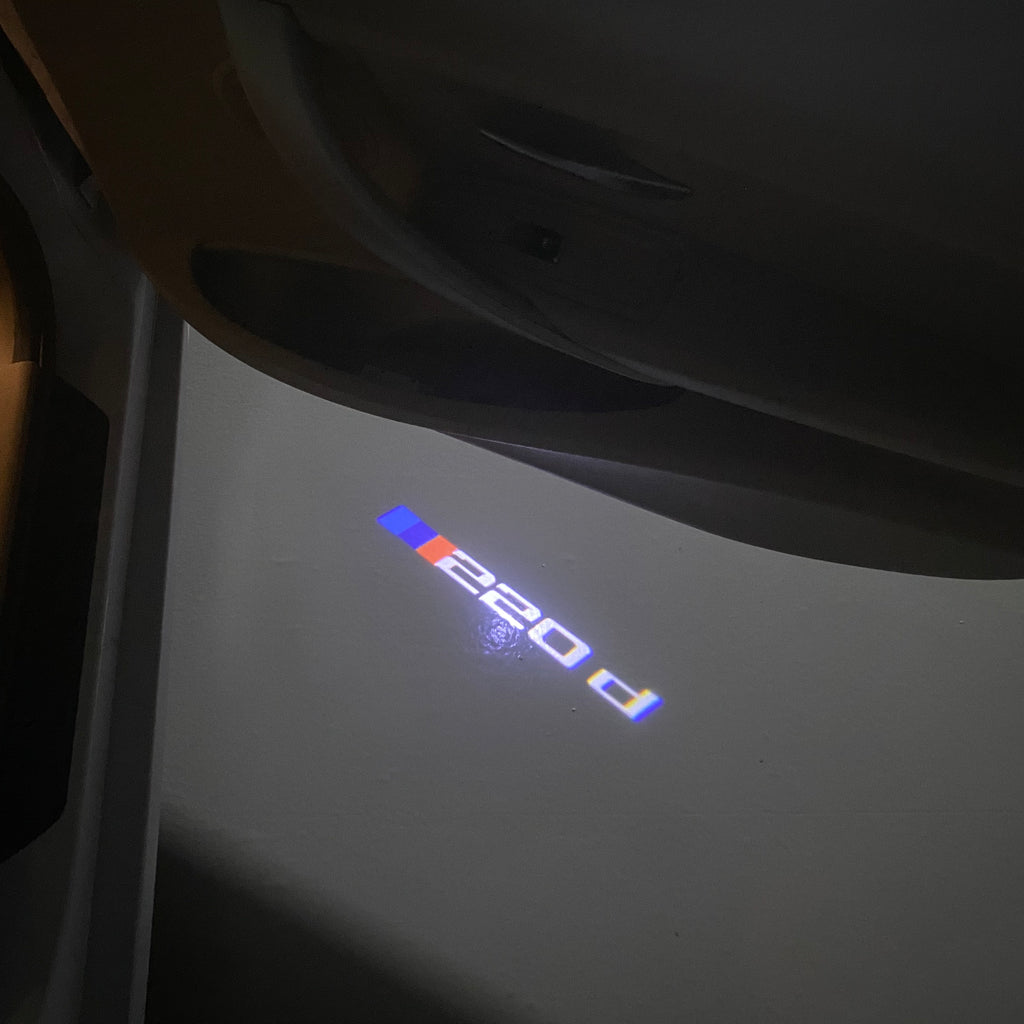 BMW M3 LOGO PROJECTOR LIGHTS Nr.24 (الكمية 1 = 1 مجموعة / 2 أضواء باب)