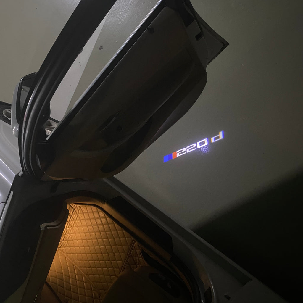 BMW M3 LOGO PROJECTOR LIGHTS Nr.24 (الكمية 1 = 1 مجموعة / 2 أضواء باب)