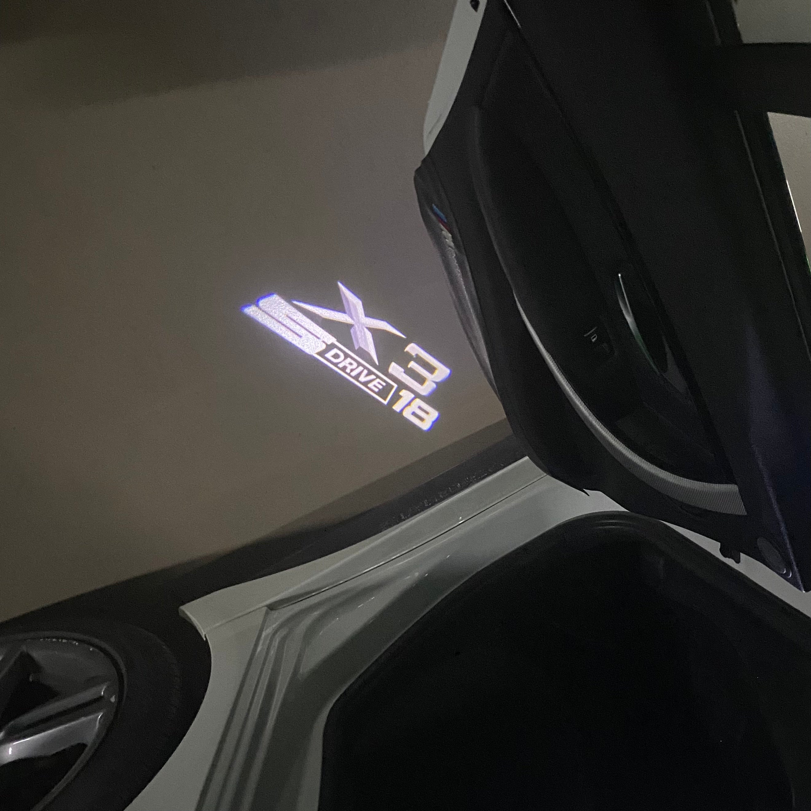 BMW X3 S Drive 18 LOGO PROJECTOT LIGHTS (quantity 1 = 1 sets/2 door lights) Nr.6024q0t26