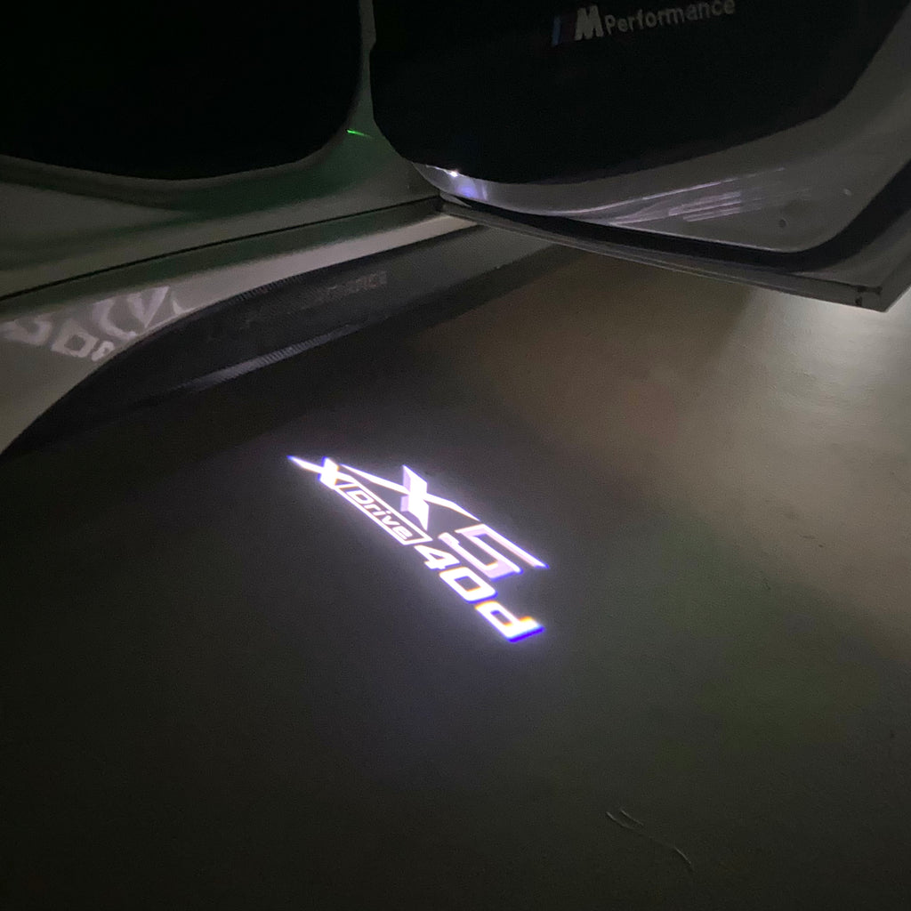 BMW M3 LOGO PROJECTOR LIGHTS Nr.24 (الكمية 1 = 1 مجموعة / 2 أضواء باب)