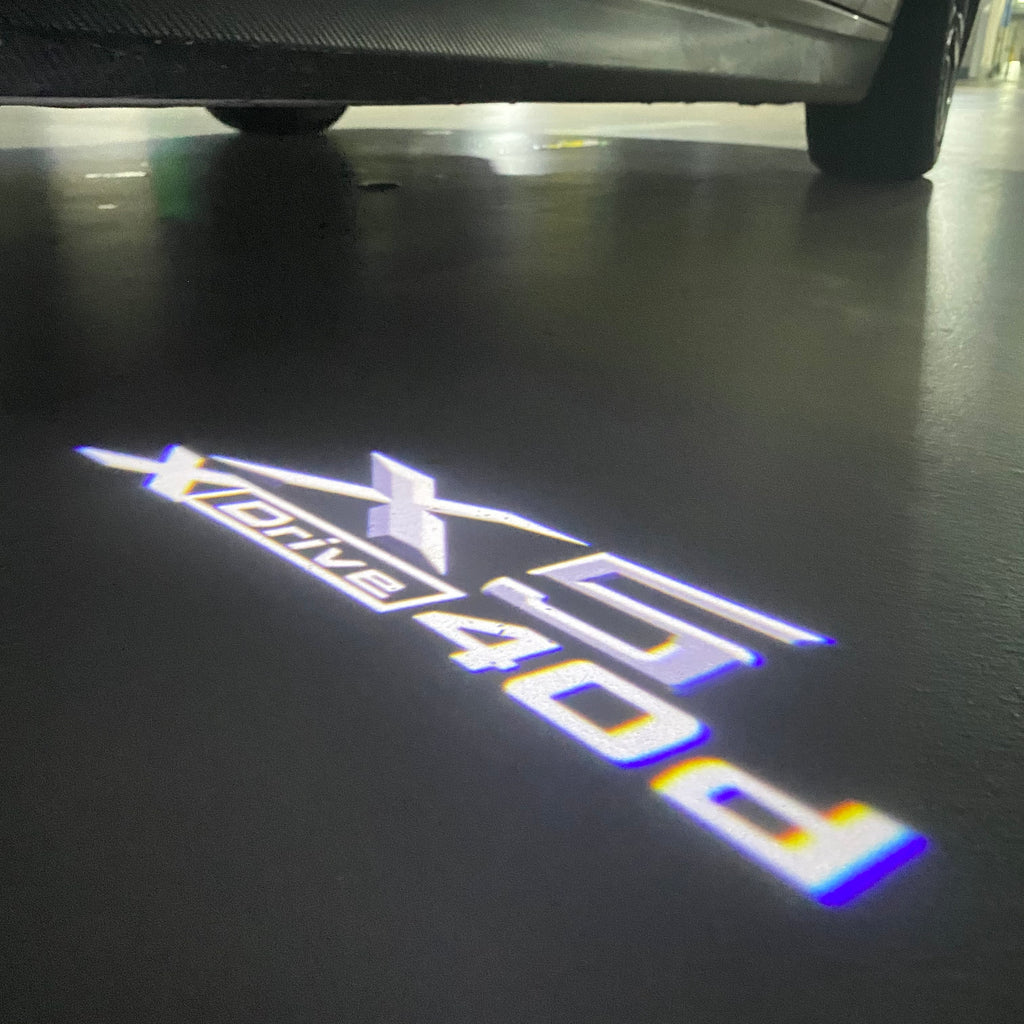 BMW M3 LOGO PROJECTOR LIGHTS Nr.24 (الكمية 1 = 1 مجموعة / 2 أضواء باب)