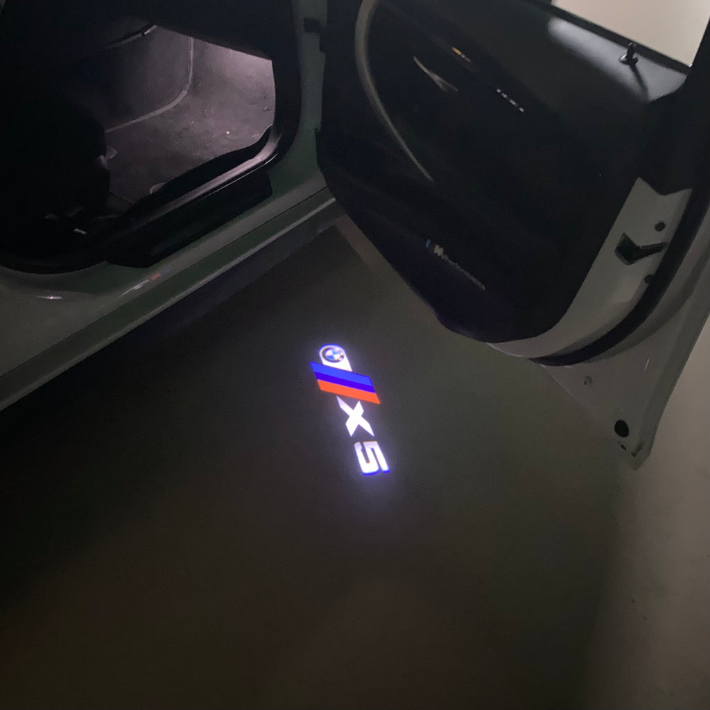 BMW M3 LOGO PROJECTOR LIGHTS Nr.24 (الكمية 1 = 1 مجموعة / 2 أضواء باب)