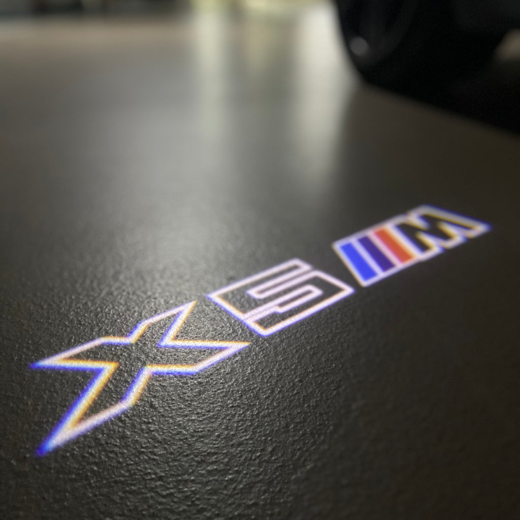 BMW M3 LOGO PROJECTOR LIGHTS Nr.24 (الكمية 1 = 1 مجموعة / 2 أضواء باب)