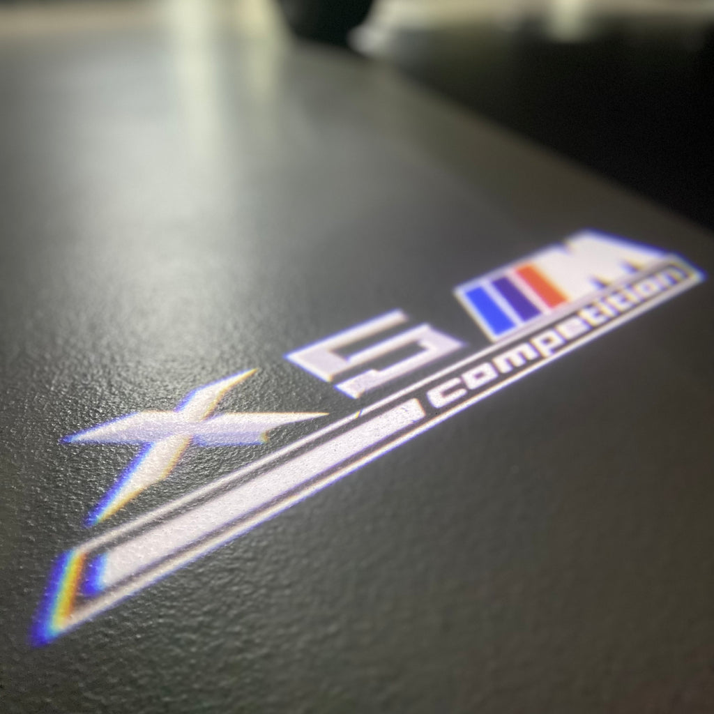 BMW M3 LOGO PROJECTOR LIGHTS Nr.24 (الكمية 1 = 1 مجموعة / 2 أضواء باب)