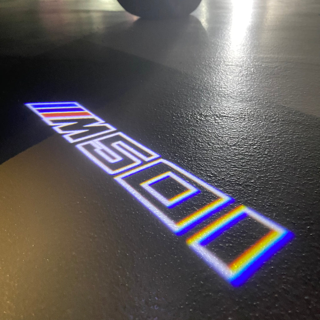 BMW M3 LOGO PROJECTOR LIGHTS Nr.24 (الكمية 1 = 1 مجموعة / 2 أضواء باب)