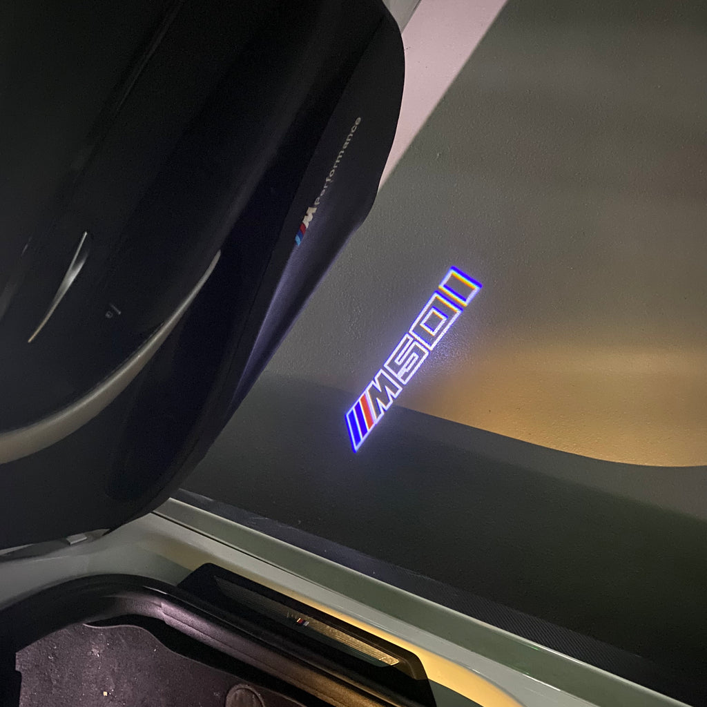 BMW M3 LOGO PROJECTOR LIGHTS Nr.24 (الكمية 1 = 1 مجموعة / 2 أضواء باب)