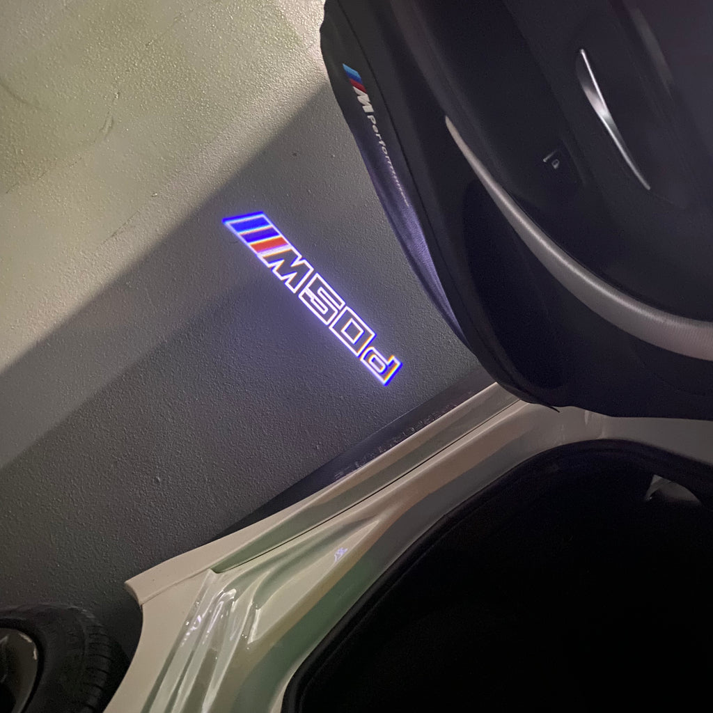 BMW M3 LOGO PROJECTOR LIGHTS Nr.24 (الكمية 1 = 1 مجموعة / 2 أضواء باب)