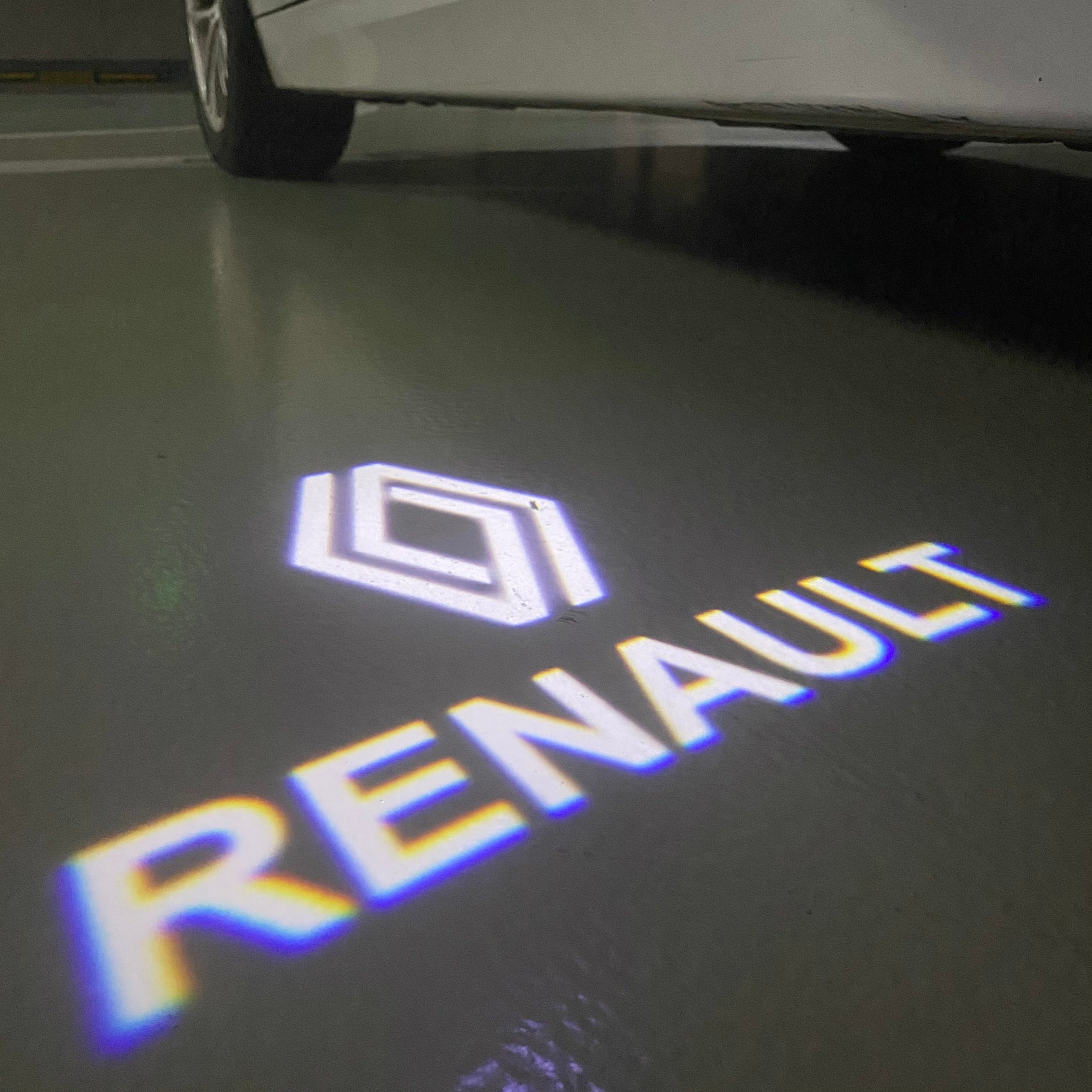 RENAULT ORIGINAL LOGO PROJECROTR LIGHTS Nr.0963 (quantity  1 =  2 Logo Film & 2 door lights)
