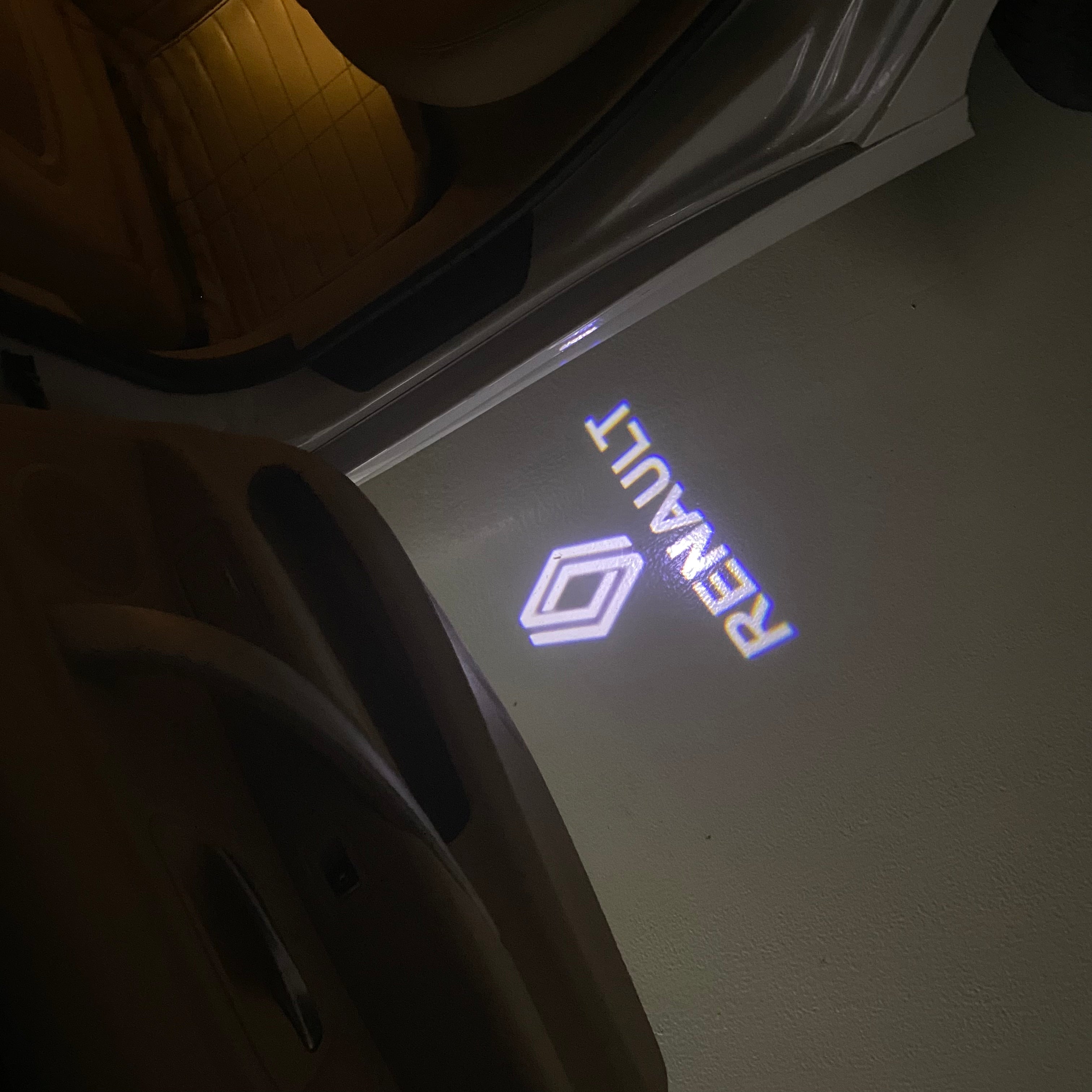 RENAULT ORIGINAL LOGO PROJECROTR LIGHTS Nr.0963 (quantity  1 =  2 Logo Film & 2 door lights)