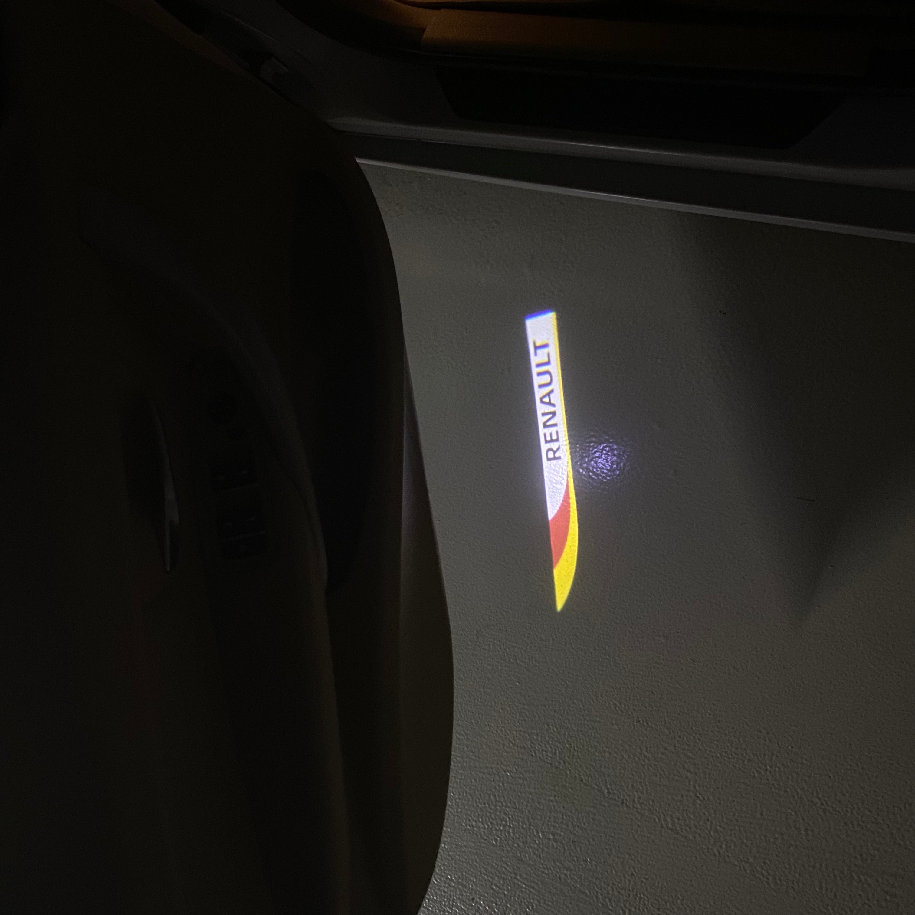 RENAULT ORIGINAL LOGO PROJECROTR LIGHTS Nr.0910 (quantity  1 =  2 Logo Film & 2 door lights)