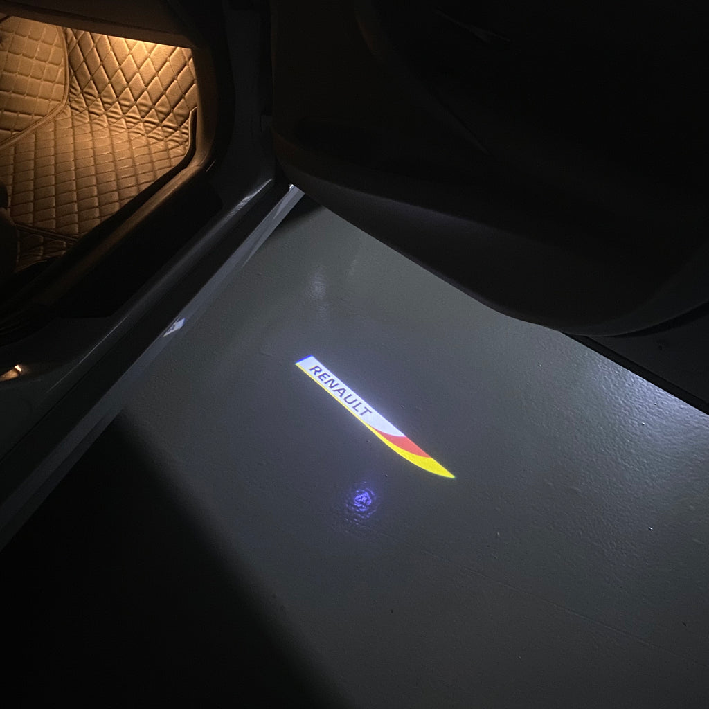 RENAULT ORIGINAL LOGO PROJECROTR LIGHTS Nr.0910 (quantity  1 =  2 Logo Film & 2 door lights)