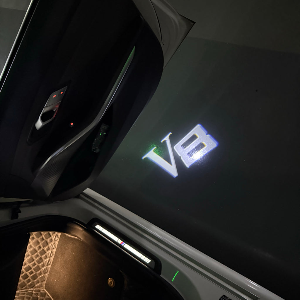 BMW M3 LOGO PROJECTOR LIGHTS Nr.24 (الكمية 1 = 1 مجموعة / 2 أضواء باب)