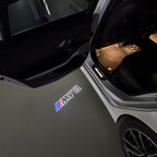 BMW M3 LOGO PROJECTOR LIGHTS Nr.24 (الكمية 1 = 1 مجموعة / 2 أضواء باب)