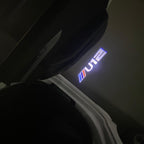 BMW M3 LOGO PROJECTOR LIGHTS Nr.24 (الكمية 1 = 1 مجموعة / 2 أضواء باب)