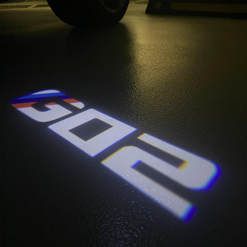 BMW M3 LOGO PROJECTOR LIGHTS Nr.24 (الكمية 1 = 1 مجموعة / 2 أضواء باب)