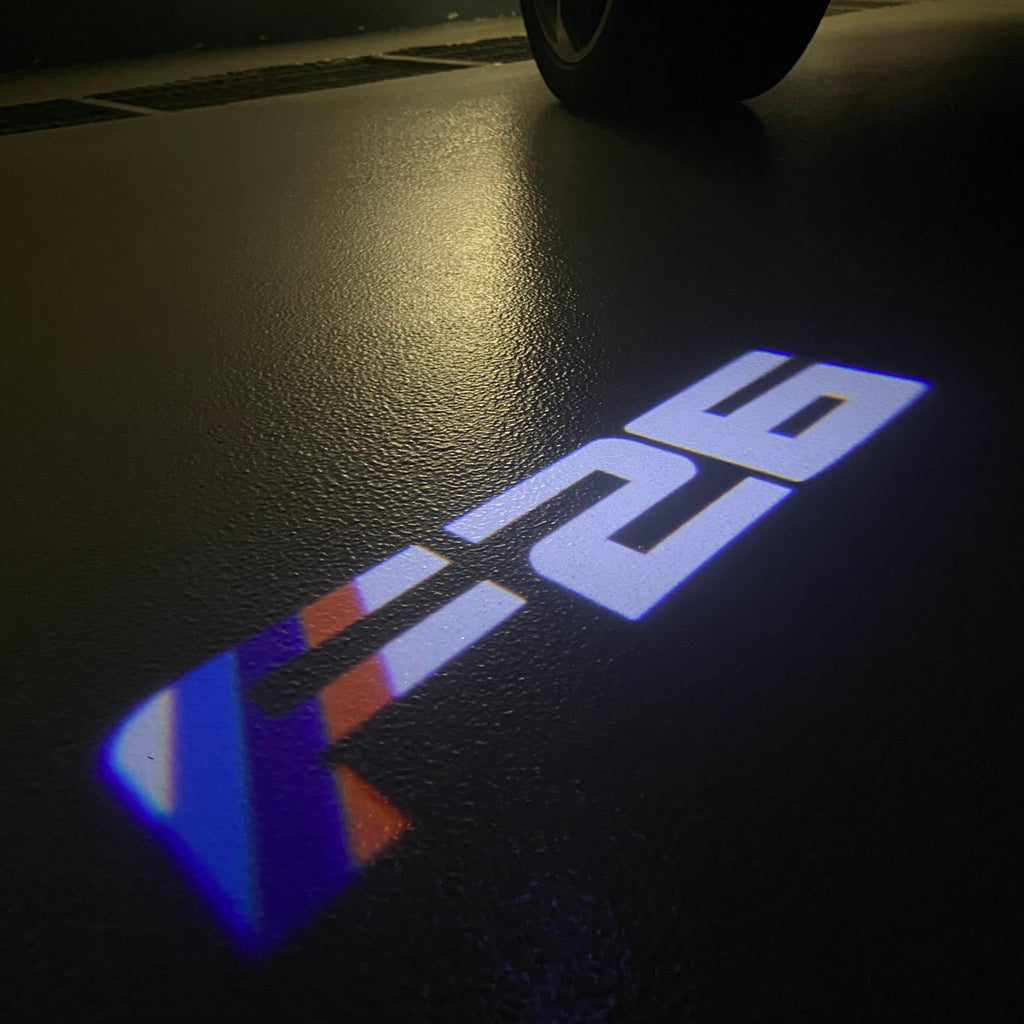 BMW M3 LOGO PROJECTOR LIGHTS Nr.24 (الكمية 1 = 1 مجموعة / 2 أضواء باب)