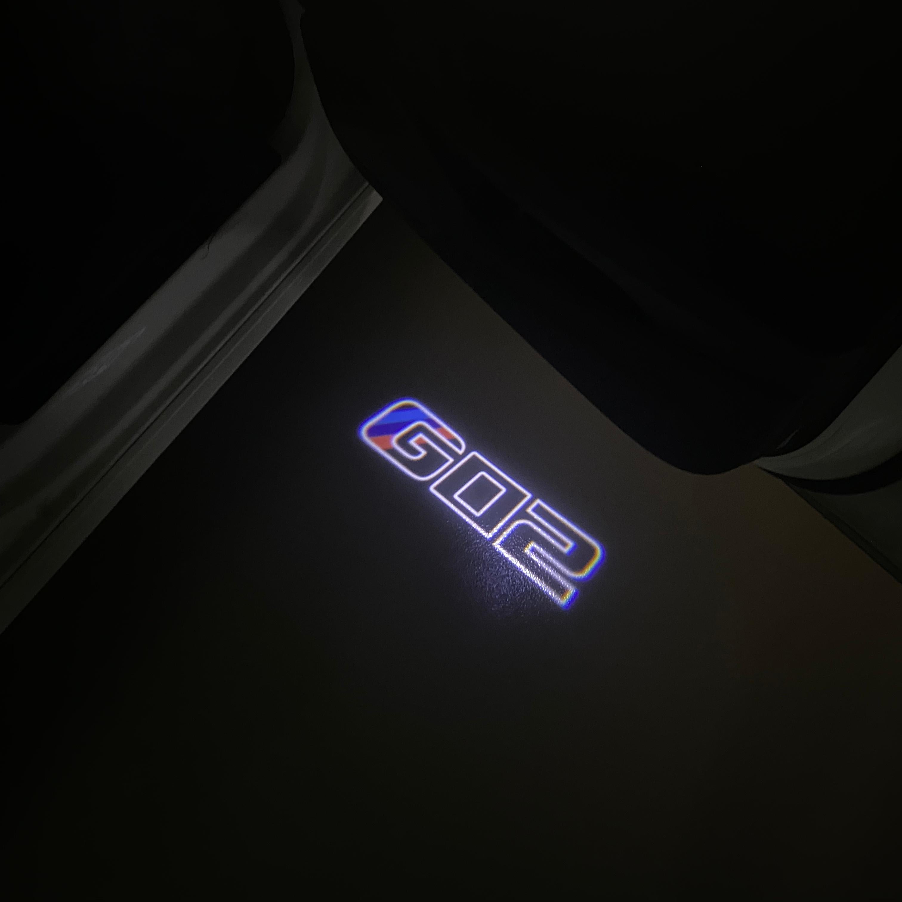 BMW X4 / X4M G02  LOGO PROJECTOT LIGHTS (quantity 1 = 1 sets/2 door lights) Nr.6024q0t03B6