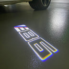 BMW M3 LOGO PROJECTOR LIGHTS Nr.24 (الكمية 1 = 1 مجموعة / 2 أضواء باب)
