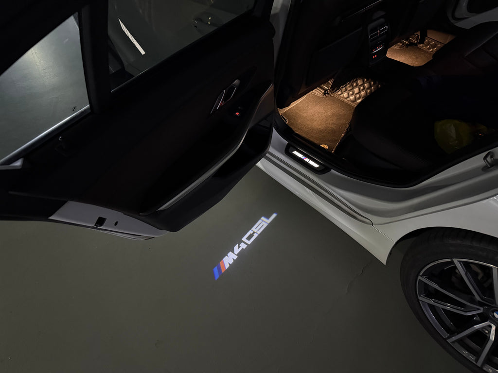 BMW M3 LOGO PROJECTOR LIGHTS Nr.24 (الكمية 1 = 1 مجموعة / 2 أضواء باب)