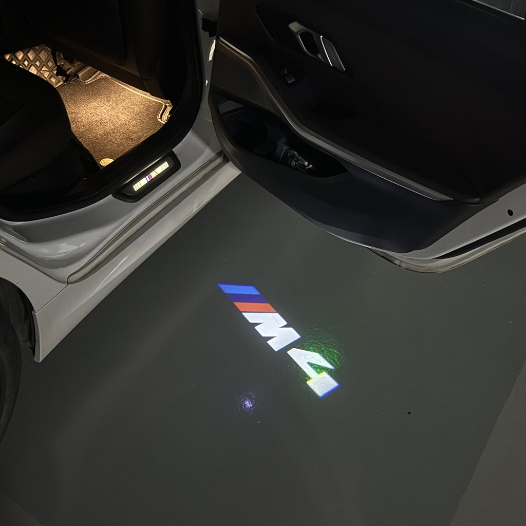 BMW M3 LOGO PROJECTOR LIGHTS Nr.24 (الكمية 1 = 1 مجموعة / 2 أضواء باب)