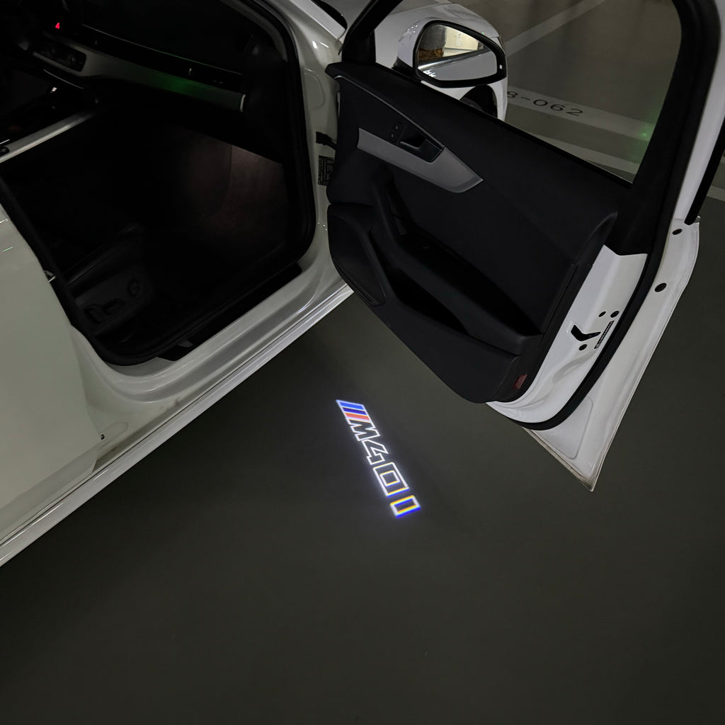 BMW M3 LOGO PROJECTOR LIGHTS Nr.24 (الكمية 1 = 1 مجموعة / 2 أضواء باب)