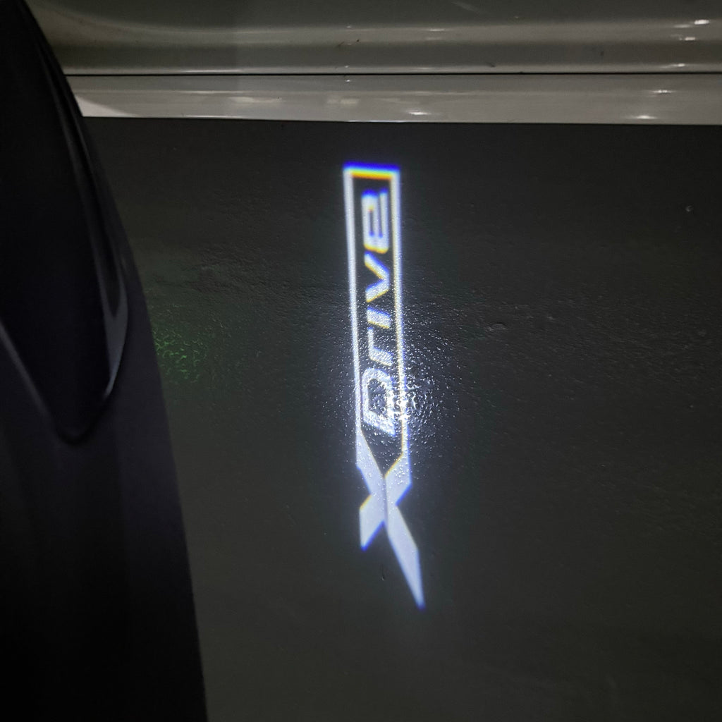 BMW M3 LOGO PROJECTOR LIGHTS Nr.24 (الكمية 1 = 1 مجموعة / 2 أضواء باب)