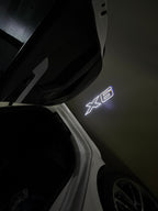 BMW M3 LOGO PROJECTOR LIGHTS Nr.24 (الكمية 1 = 1 مجموعة / 2 أضواء باب)