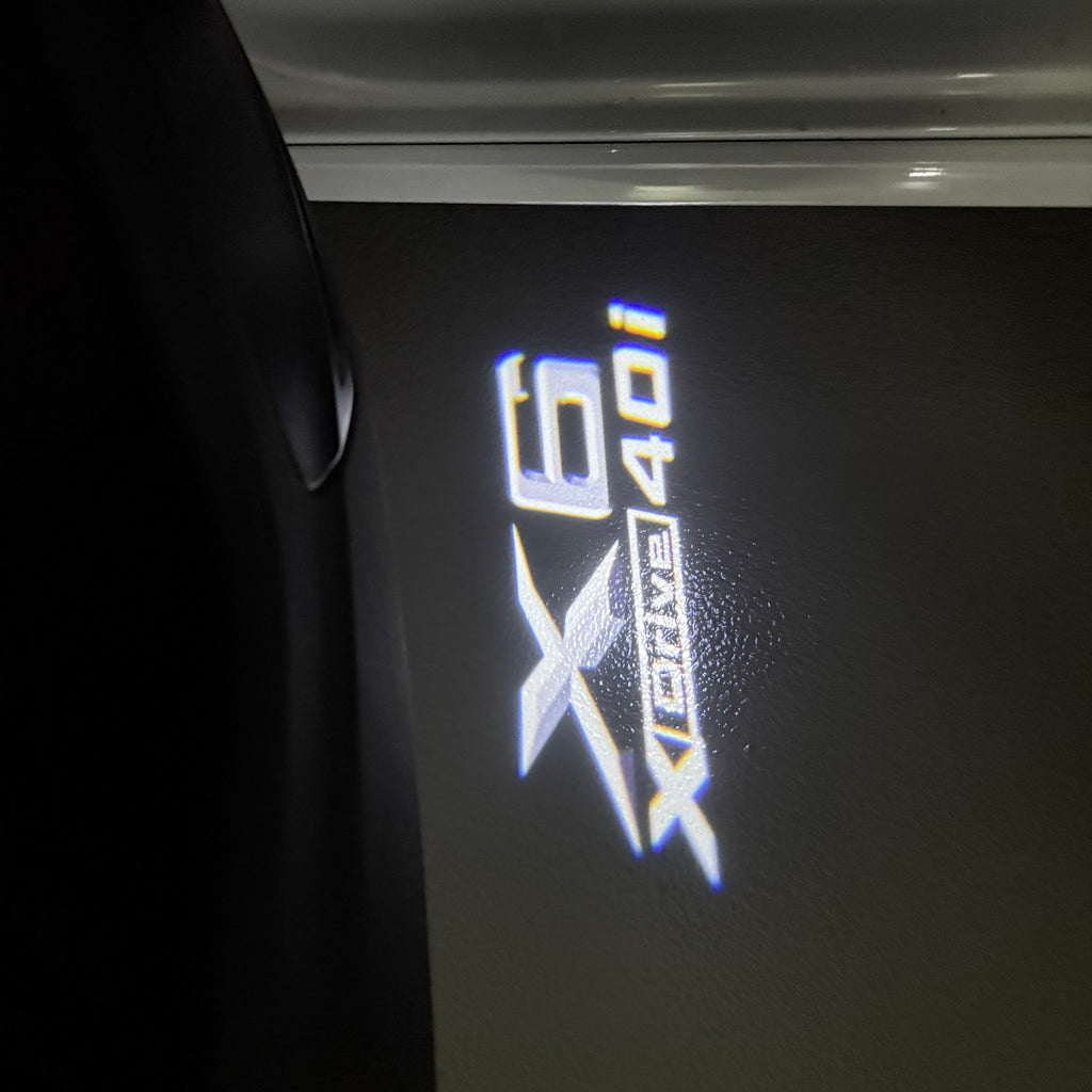 BMW M3 LOGO PROJECTOR LIGHTS Nr.24 (الكمية 1 = 1 مجموعة / 2 أضواء باب)